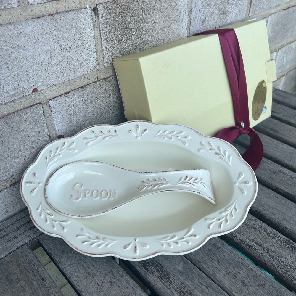 Ceramic serving bowl with matching spoon